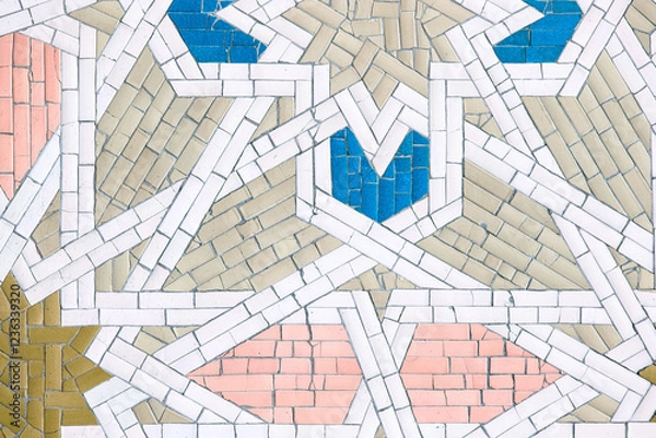 Fototapeta Islamic mosaic with geometric patterns, vibrant colors, and symmetry. Blue, white, red tiles reflect craftsmanship and cultural heritage. C