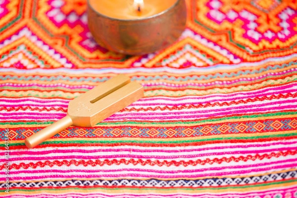 Obraz tuning fork on a fabric.