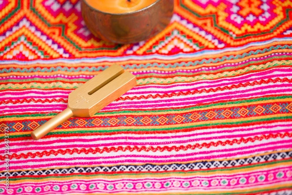 Obraz tuning fork on a fabric.