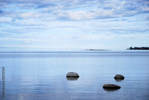Obraz Coastal view with rocks in calm water