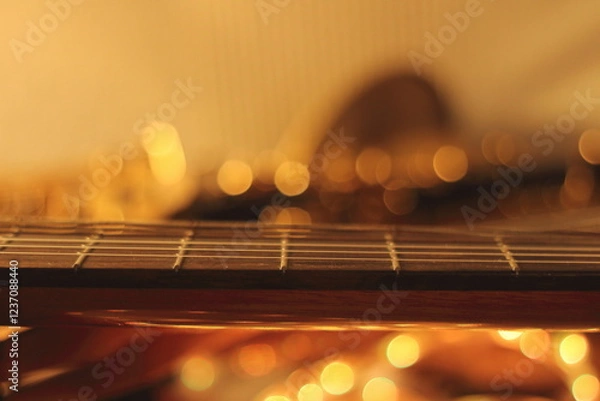 Fototapeta Strings and Glow A Guitars Perspective