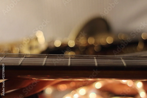 Fototapeta Strings and Glow A Guitars Perspective