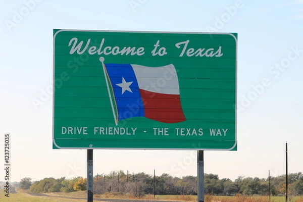 Fototapeta Welcome sign along the highway for Texas