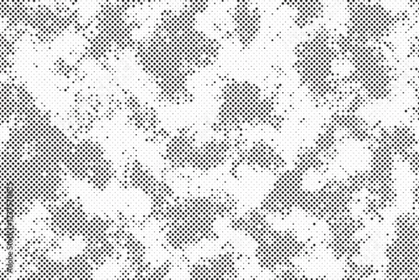 Fototapeta Abstract halftone gradient background. Dotted texture with fading effect. Black and white circle shade wallpaper. Grunge rough vector. Monochrome backdrop.