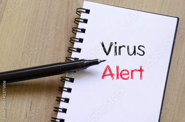 Obraz Virus alert text concept on notebook