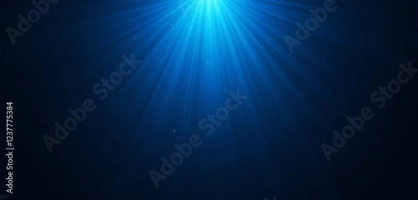 Fototapeta Stunning Underwater Scene with Bright Blue Light Rays and Sparkling Particles, Deep Ocean Background