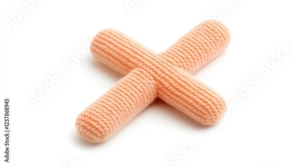 Fototapeta Soft, orange plush toy cross on a white background, ideal for pet play or decorative use