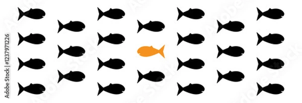 Fototapeta A fish swimming against a crowd of fish in the other direction. A concept showing individual thinking, one's own unimposed personal path and achievements.