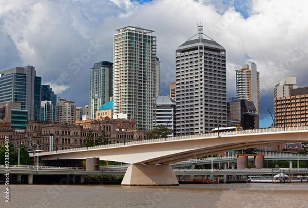 Fototapeta Skyline of the CBD district of Brisbane Australia with 'Victoria bridge' spanning the Brisbane river 