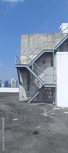 Fototapeta open space on building rooftop with blue sky background