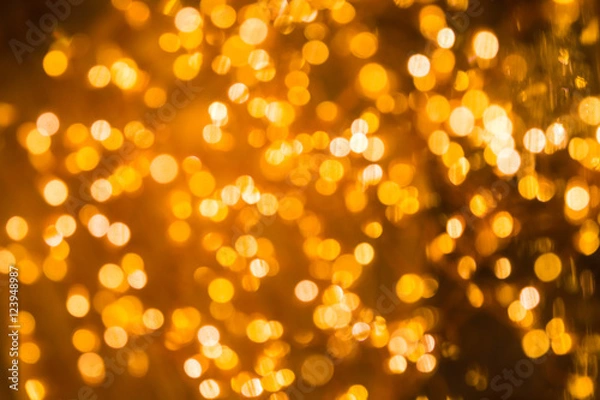 Obraz Blurry lights, out of focus.
Warm golden glow. Background use.
