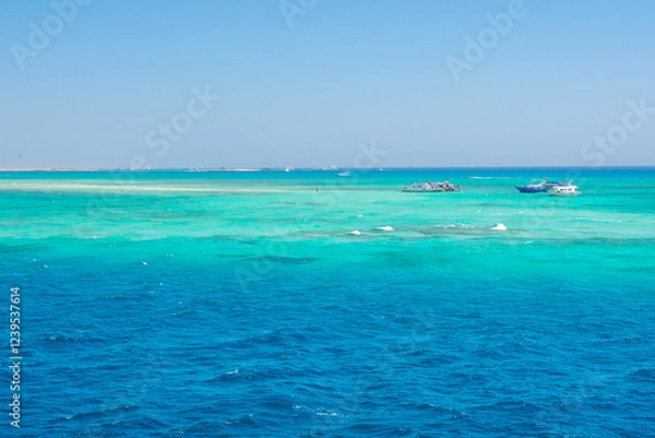 Fototapeta View from boat on Red Sea And Hurghada in Egypt. Cristal clear water and View at city. 