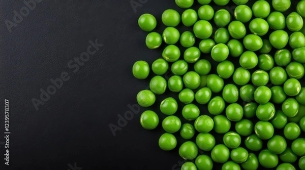 Fototapeta Fresh Green Peas on Black Surface, Bright and Vibrant Natural Vegetables for Culinary and Health Concepts