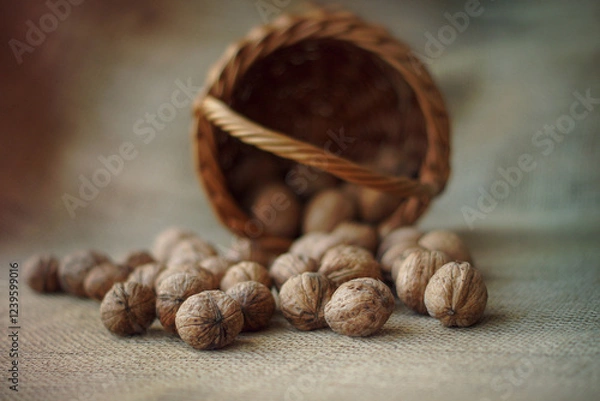 Obraz nuts scattered on the table, close-up, copy space, background, basket

