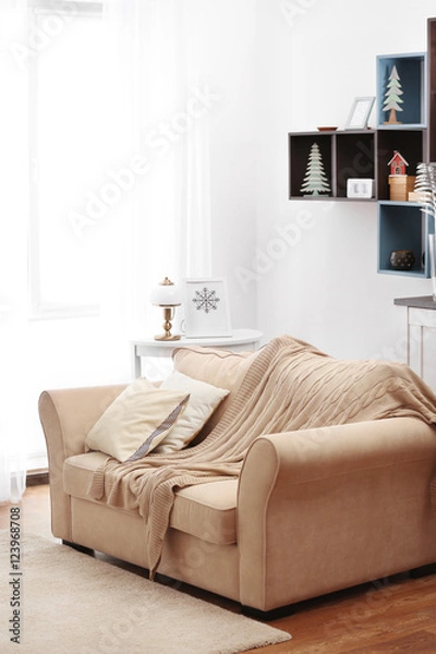 Fototapeta Beautiful interior with couch, shelf and window