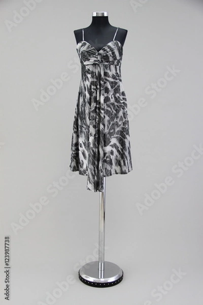 Obraz Pattern dress on a model stand against a gray background