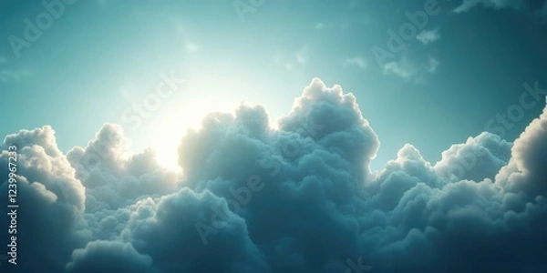 Fototapeta Majestic clouds and light rays in a sky at sunrise or sunset.