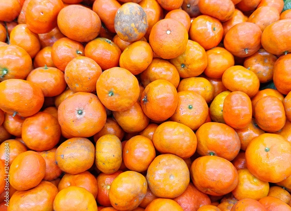 Fototapeta Group of tangerine selling in market