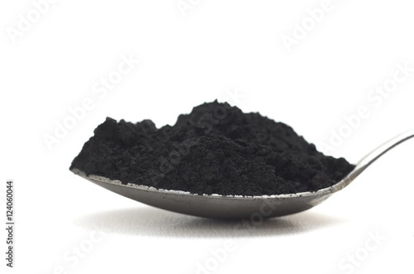 Obraz activated charcoal on white background