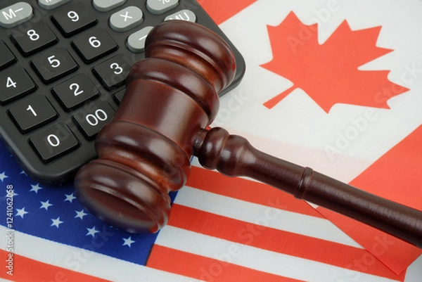 Fototapeta Import tariffs between United States and Canada. US and Canadian flags under judge gavel and calculator.