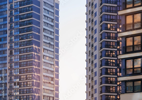 Fototapeta City view on a sunny day. Modern buildings, walls and windows. 