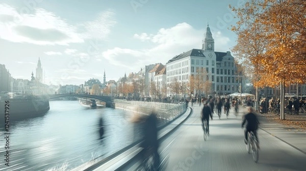 Obraz Bustling River Scene with Cyclists and Pedestrians