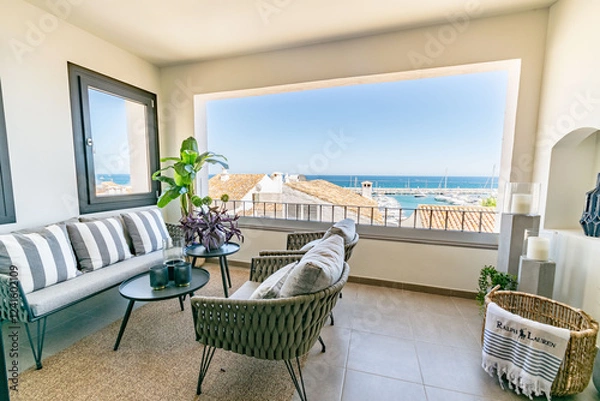Obraz an image on a luxury apartment terrace overlooking the portside town of Puerto Banus 