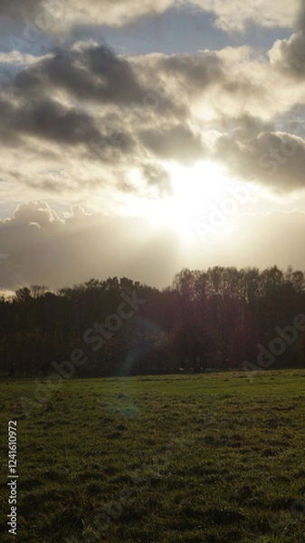 Obraz sunlight still breaks through the clouds before the autumn heavy rain