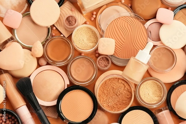 Fototapeta Varieties of face powders and foundations for perfect complexion, basic make up products to even out and matte skin, beauty cosmetics with brushes and sponges