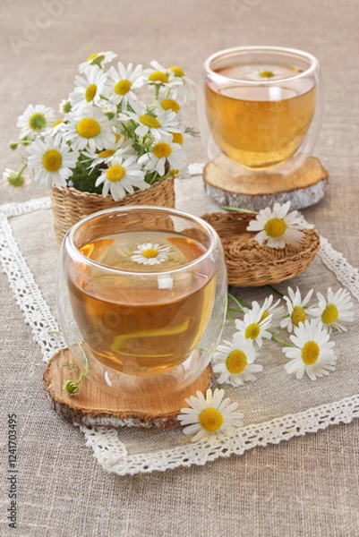 Fototapeta Two cap of tea with chamomile