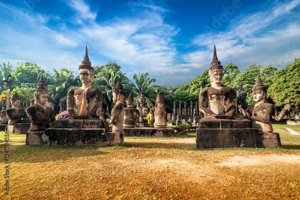 Fototapeta Amazing view of mythology and religious statues at Wat Xieng Khuan Buddha park. Vientiane, Laos