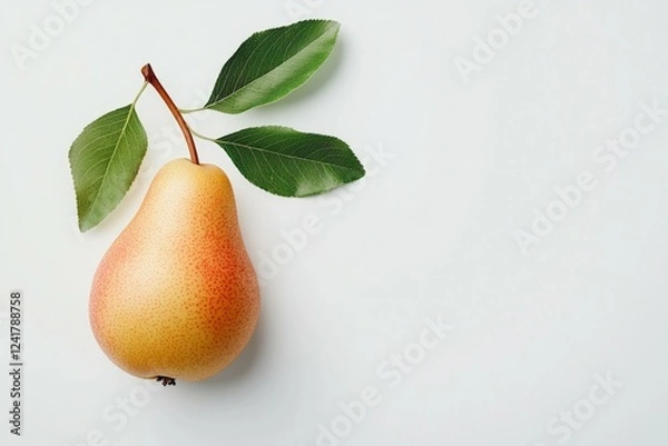 Fototapeta Ripe pear with a leaf on top of it