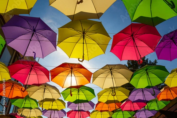 Obraz Many colorful umbrellas against a cloudless  sky