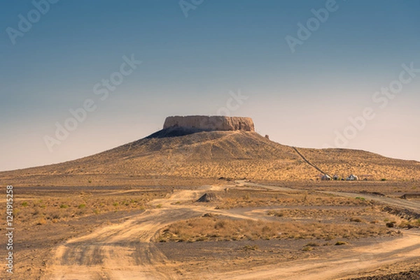 Fototapeta The fortress of Chilpik Kala,  a tower of silence (dakhla) of the ancient Zoroastrian religion, serving as burial site in the desert, Uzbekistan