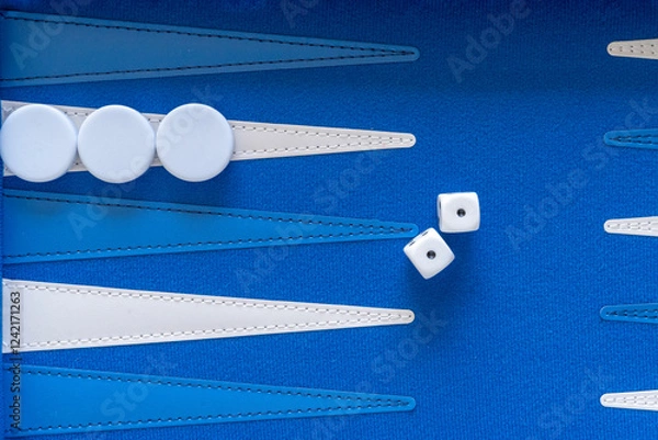 Obraz Two Dices on a blue backgammon board