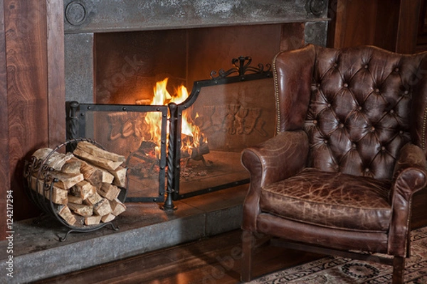 Obraz Leather Armchair And Fireplace