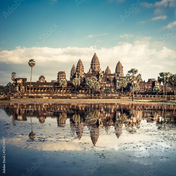 Fototapeta Ancient Khmer architecture. Panorama view of Angkor Wat temple under blue sky. Siem Reap, Cambodia