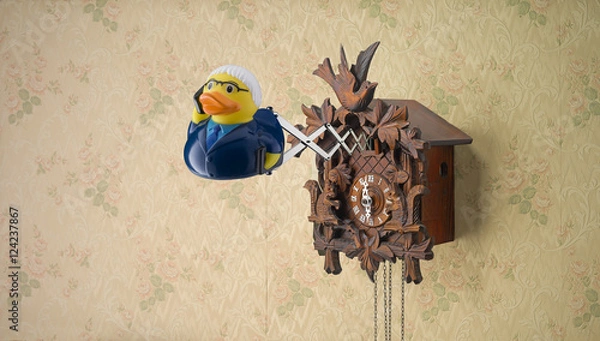 Fototapeta Salesman Rubber Duck coming out of cuckoo clock