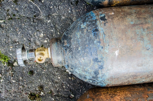 Fototapeta a lot of Danger gas bottle / gas cylinder valve / gas bottle / Oxygen tank / Industrial Nitrogen cylinders in group / Scuba air tanks with valves