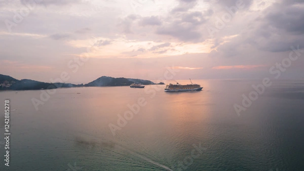 Obraz Aerial view, drone flying over Phuket city, Thailand. Drone over Patong Beach on Sunday in Phuket and tourists shopping at a street full of local merchants selling food, people resting by the sea.