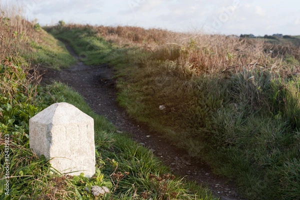 Fototapeta White milestone marker