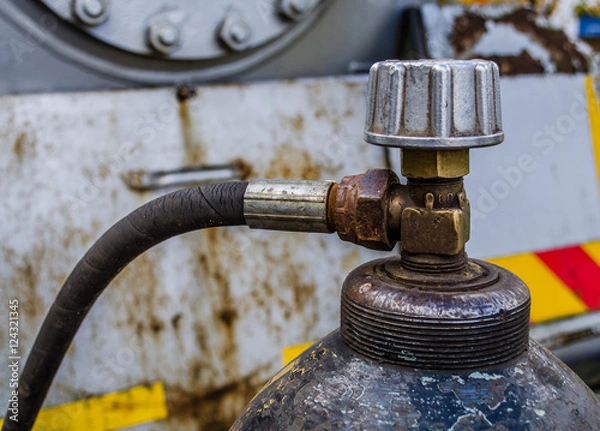 Fototapeta gas oxygen cylinders close up / a welding gas cylinder pressure gauge / gas cylinder valve / Scuba air tanks with valves / Pressurized gas cylinder,CO2 gas venting to release pressure