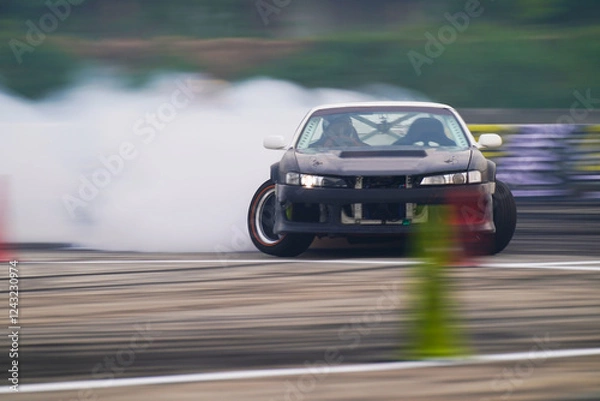 Fototapeta car control drifting on Race track