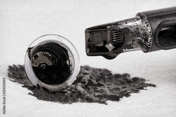 Obraz Tattoo machine with needle and ink. Stock image, macro shot.