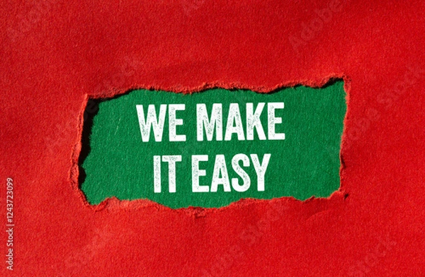 Fototapeta We make it easy message written on ripped torn red paper on green background. Conceptual we make it easy symbol. Copy space.
