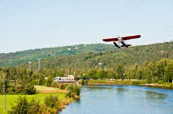 Obraz An Alaskan float plane takes off from a river in Fairbanks.