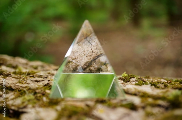 Fototapeta A figurine of a glass pyramid. A powerful Feng Shui symbol.