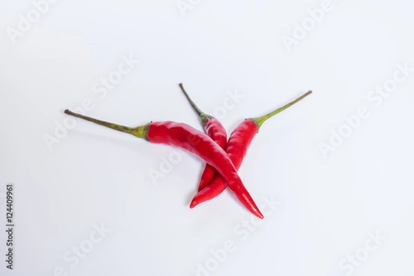 Obraz Red peppers isolate on a white background.