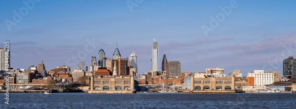 Fototapeta Panoramic view of the Philadelphia Pennsylvana skyline seen from the Wiggins Park Promenade on the Camden New Jersey side odf the Delaware River