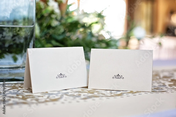 Fototapeta Two blank name labels placed on the table